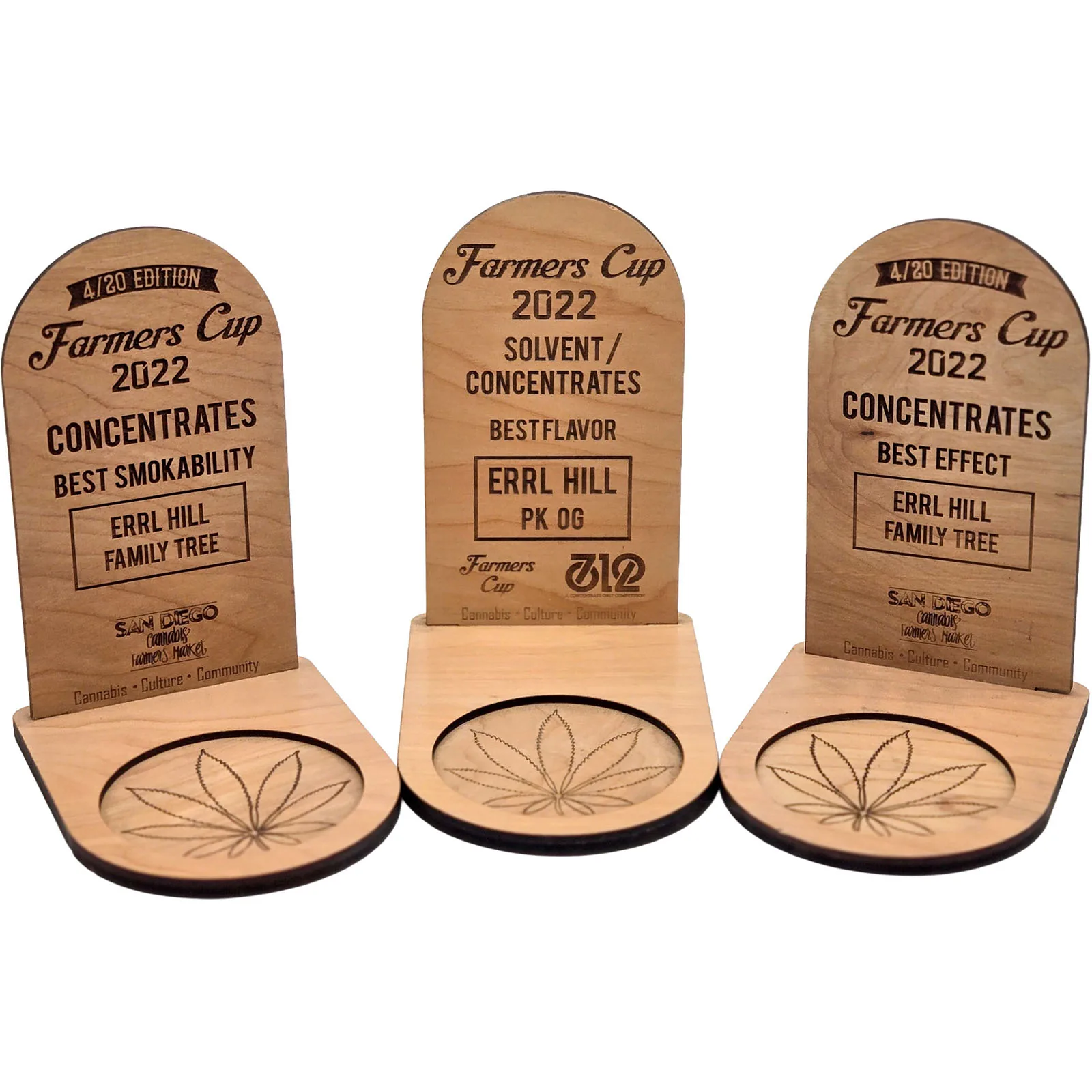 Three 2022 Farmers Cup trophies for Errl Hill Family Tree and PK OG concentrates.